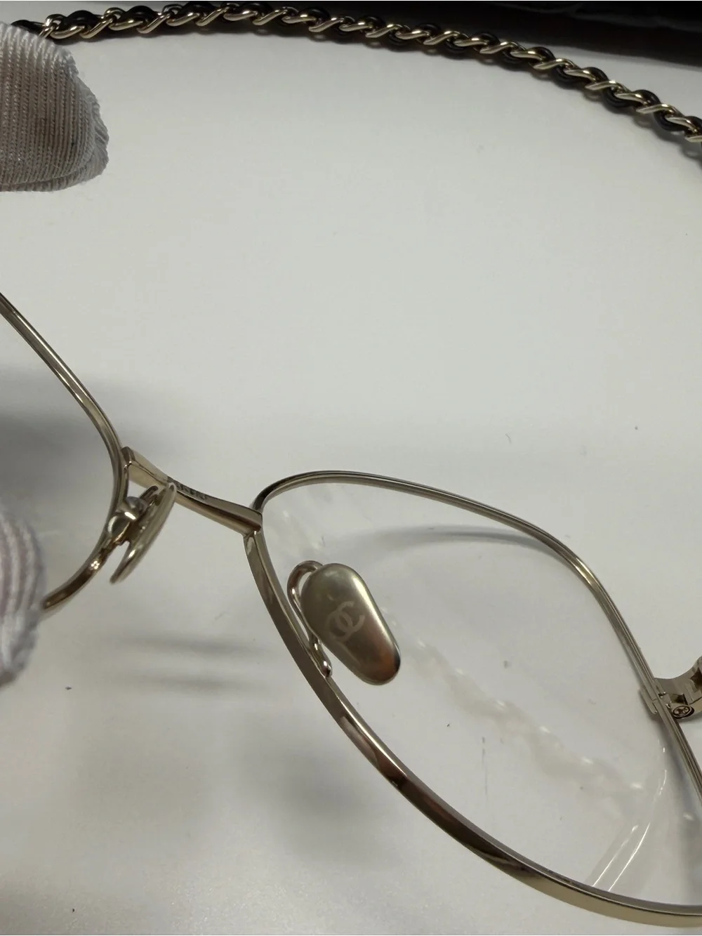 CHANEL  Gold and Black Eye ear Chain with Silver-Tone Glasses